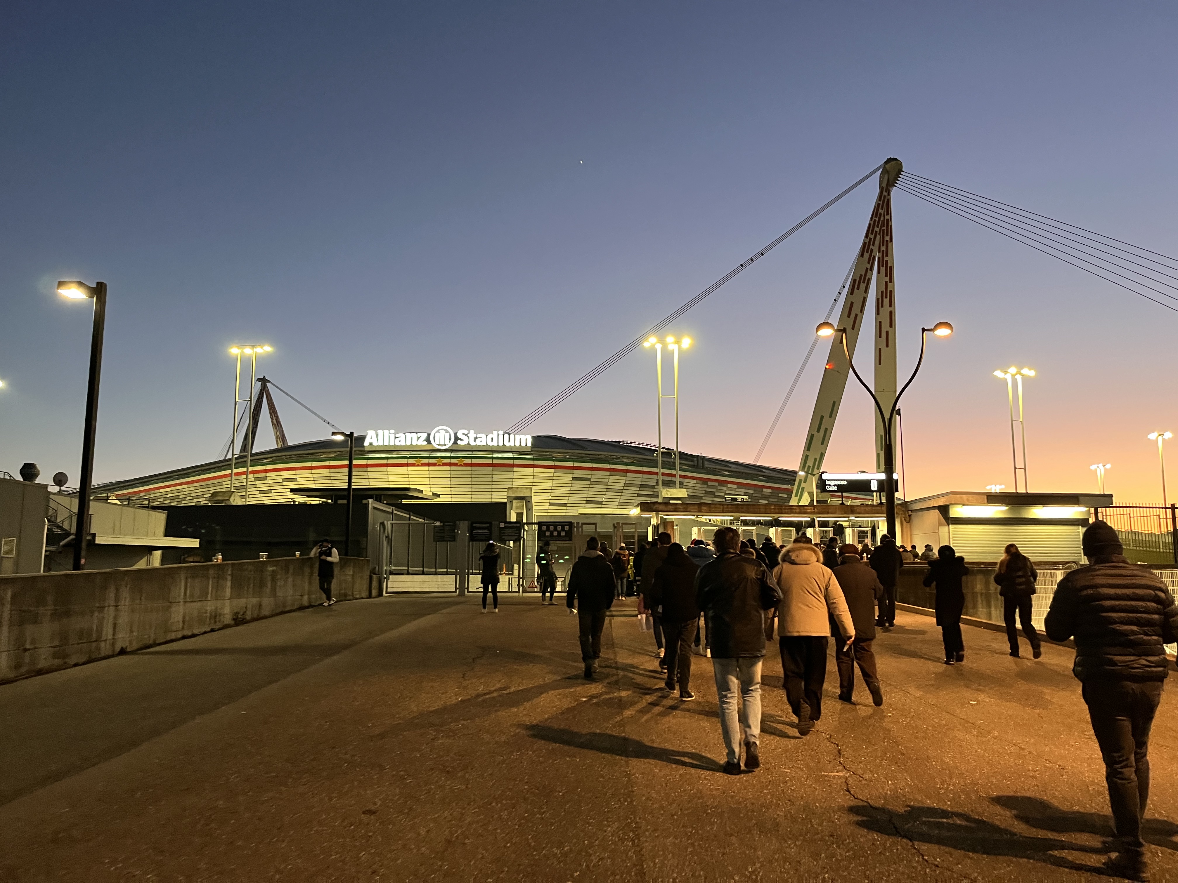 Allianz Stadium and Juventus supporters in Turin